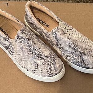 Slip on snake skin shoes